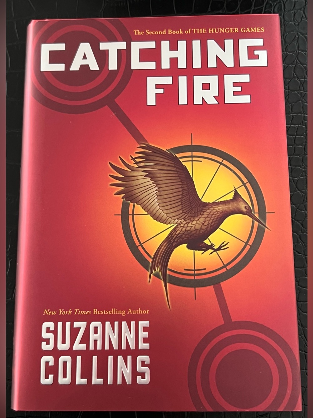 Scholastic Catching Fire by Suzanne Collins Hardcover Book